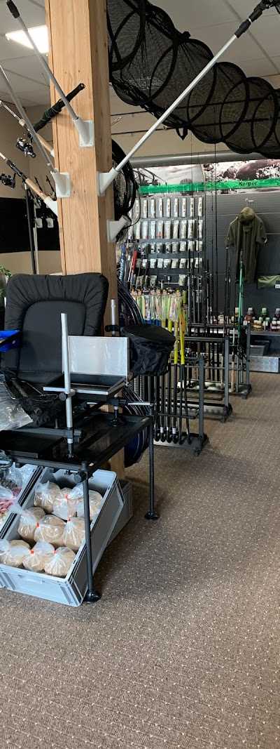 HDG Handelsonderneming / Hengelsport / Diervoeders / Robot - en Grasmaaiers / KRESS foto 2